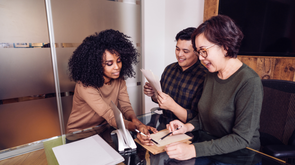 hr specialist helping a business owner with their Employee Handbook Updates for 2025