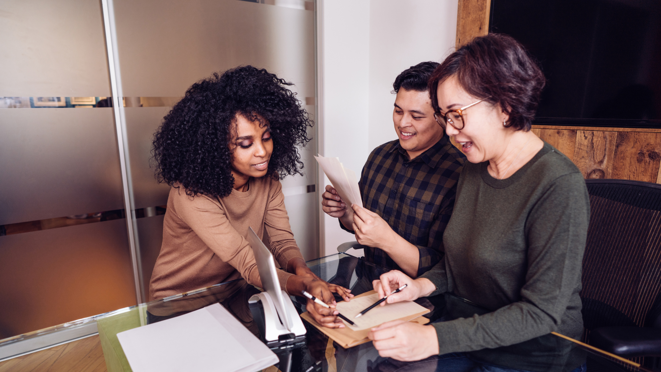 hr specialist helping a business owner with their Employee Handbook Updates for 2025